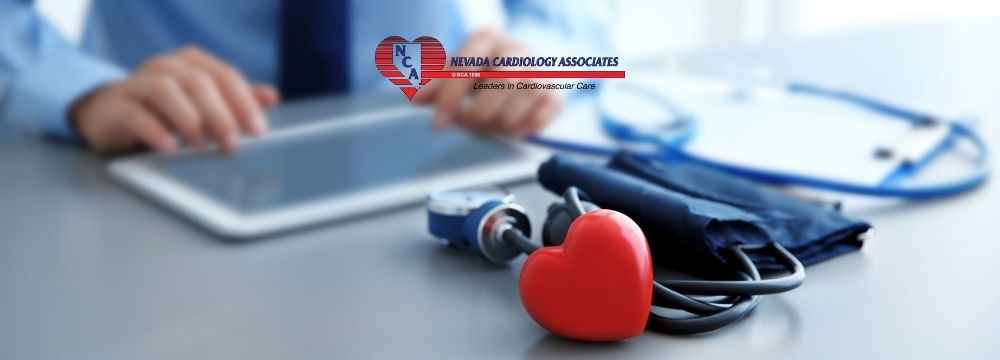 Cardiologist reviews a patients health history and labs to determine what cardiovascular screening is appropriate at Nevada Cardiology Associates 