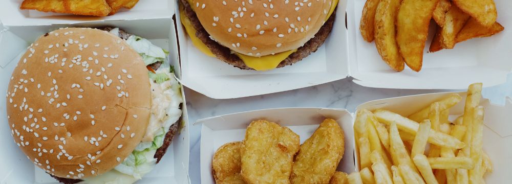 assortment of fast food in boxes